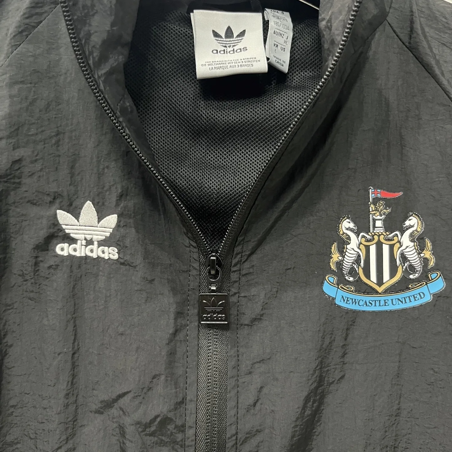 R1009 复古纽卡风衣